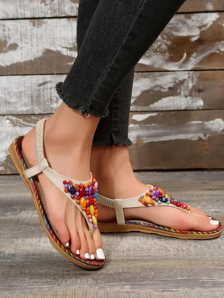 beaded thong sandals with cargo pants
