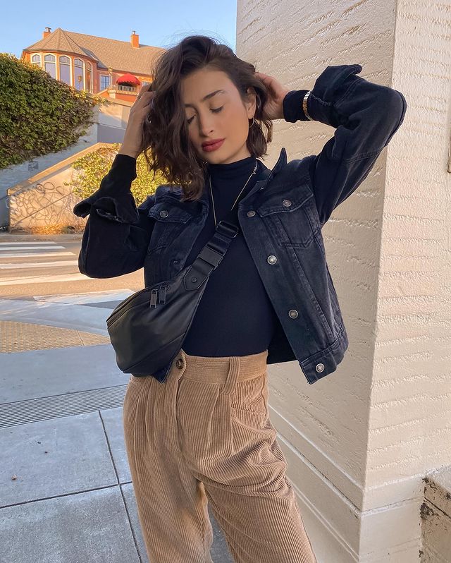 Girl wearing Jean jacket with Brown Pants