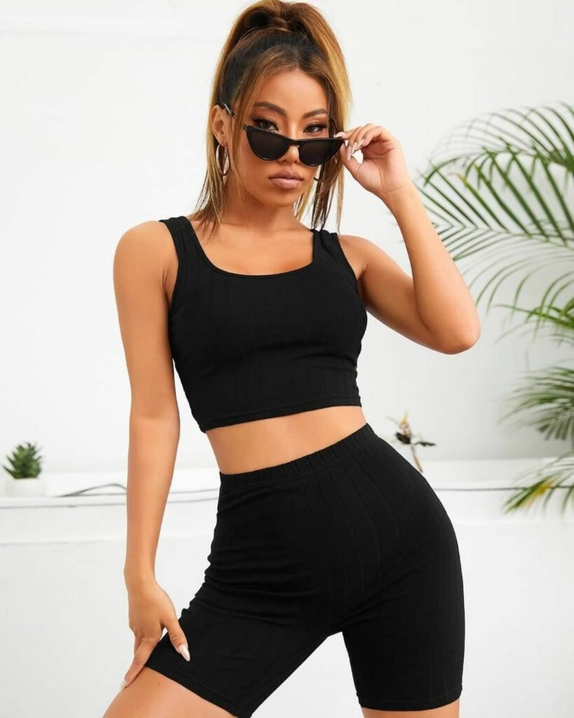 woman wearing black Tank Tops with black shorts