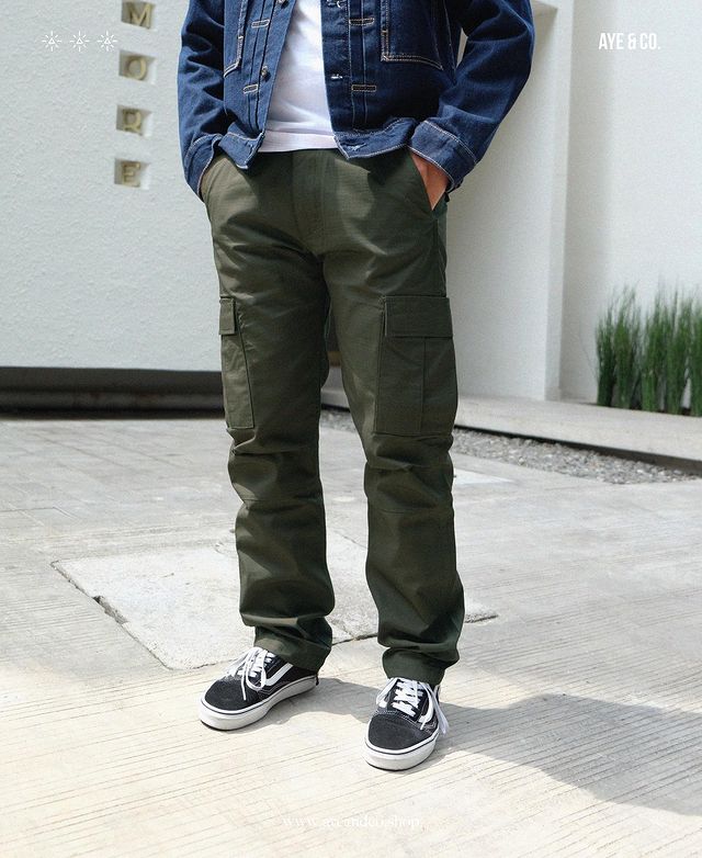 Man wearing cargo pants and jean jacket