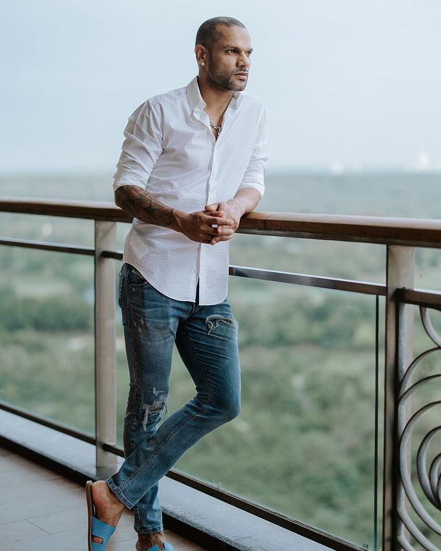 man wearing white dress shirt with a jeans