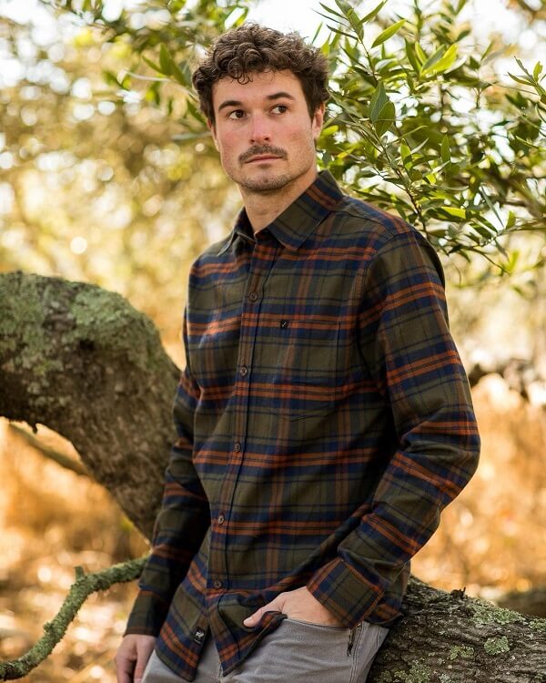 closeup view of a man wearing flannel shirt outdoor