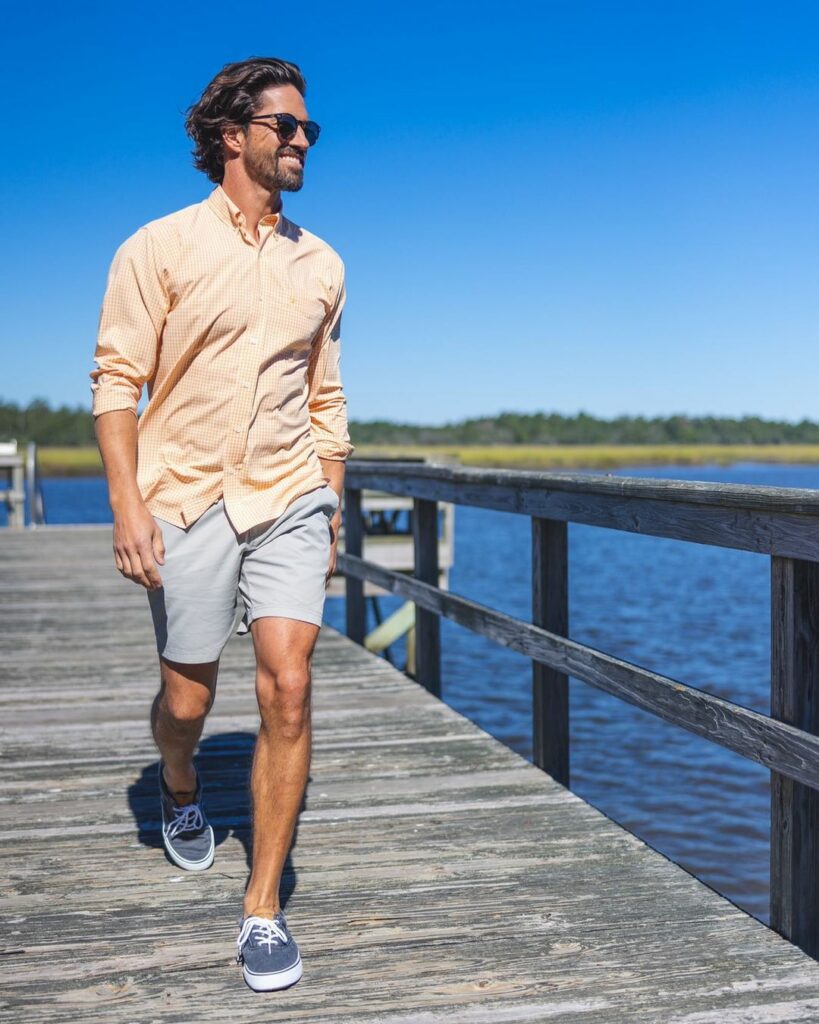 guy wearing shorts with shirt outdoor