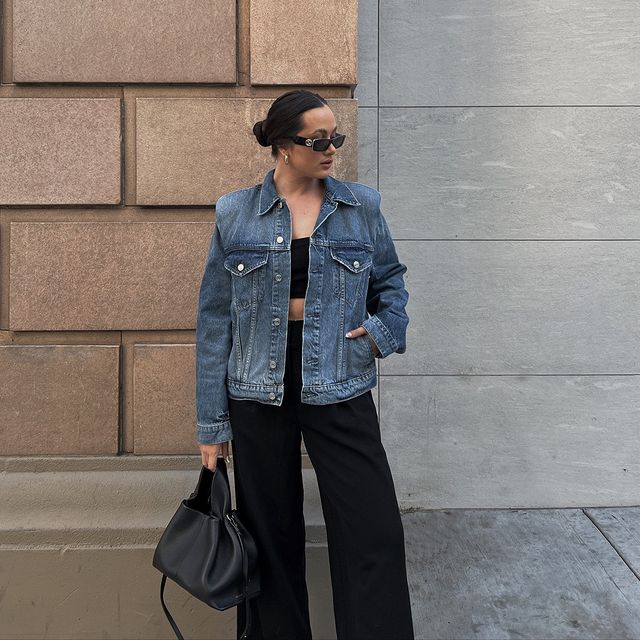90s style in Wide-leg pants and denim jacket