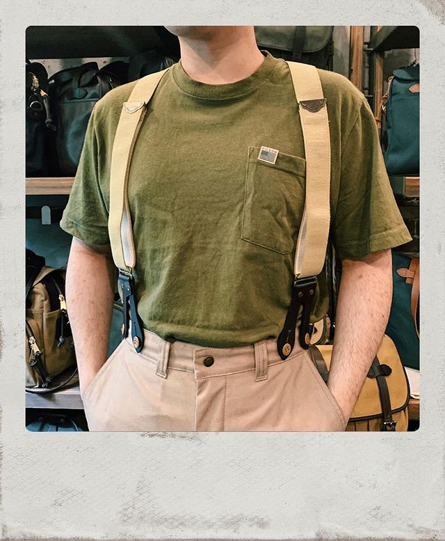 Man wearing green t-shirt with Button-on Suspenders