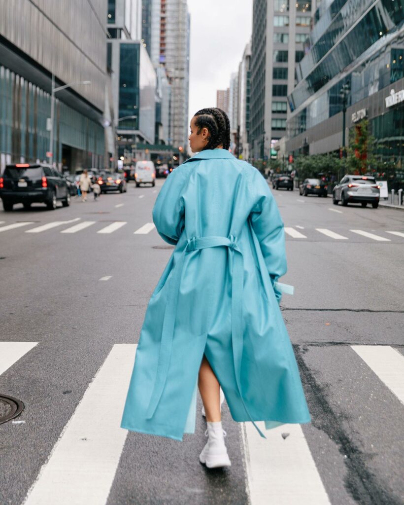 Woman in blue Trench coat