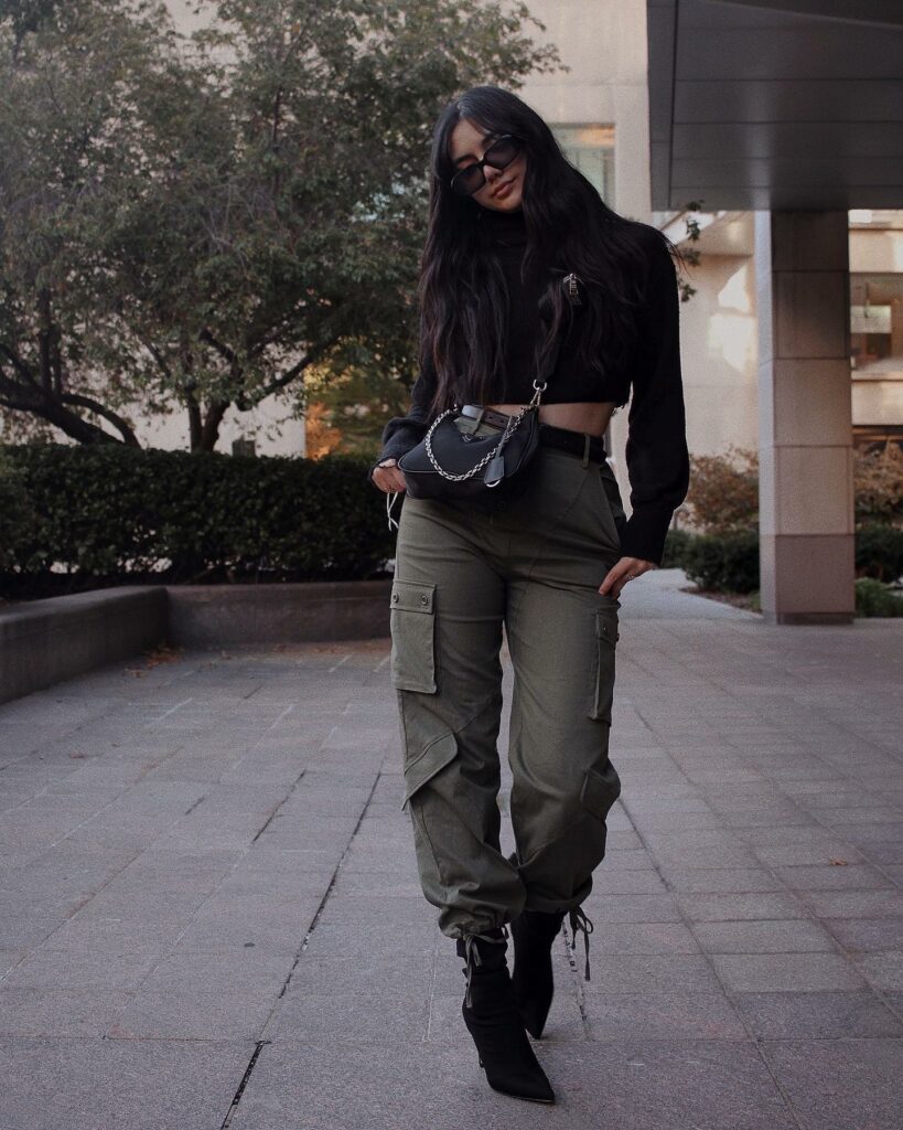 woman wearing ankle boots with cargo pants