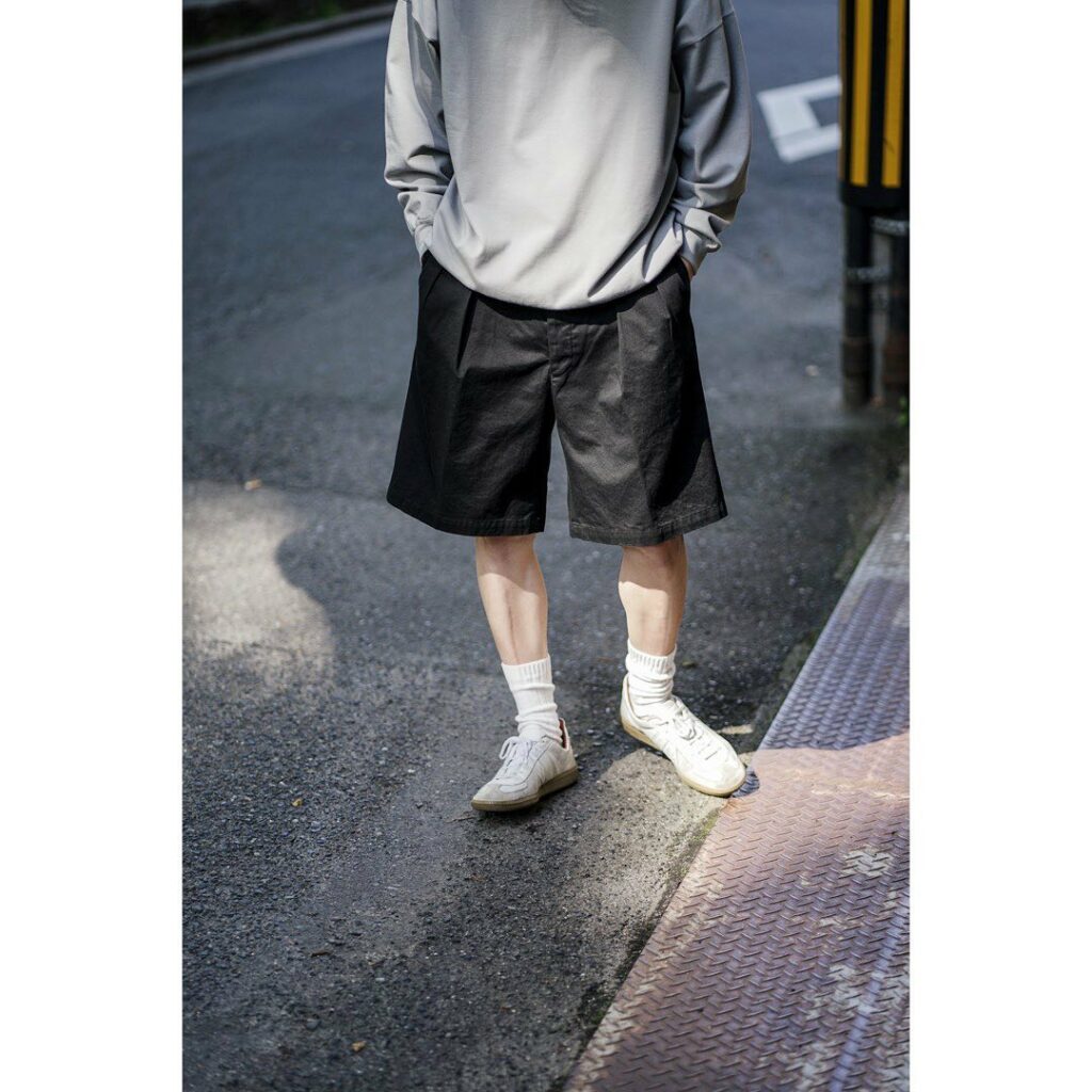 man wearing black Chino Shorts